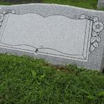 Stock #10
Open Book panel w/ wild roses, polished face, serp. top, sawn back, BRP
Barre Gray granite
36" x 10" x 16" slant