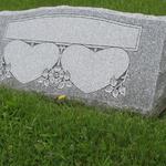 Stock #30
Polished face, serp top, sawn back, BRP 
Heart name panels & rosettes
Barre Gray granite 
36" x 10" x 16" slant