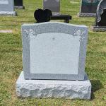 Barre Gray Granite with flat carved angels in each top corner
Monument- 2-6 x 0-8 x 2-4 polished 2, serp top, BRP